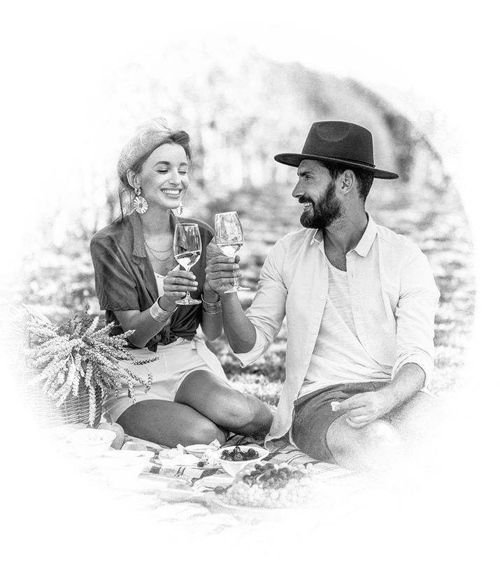 Black & white couple enjoying wine