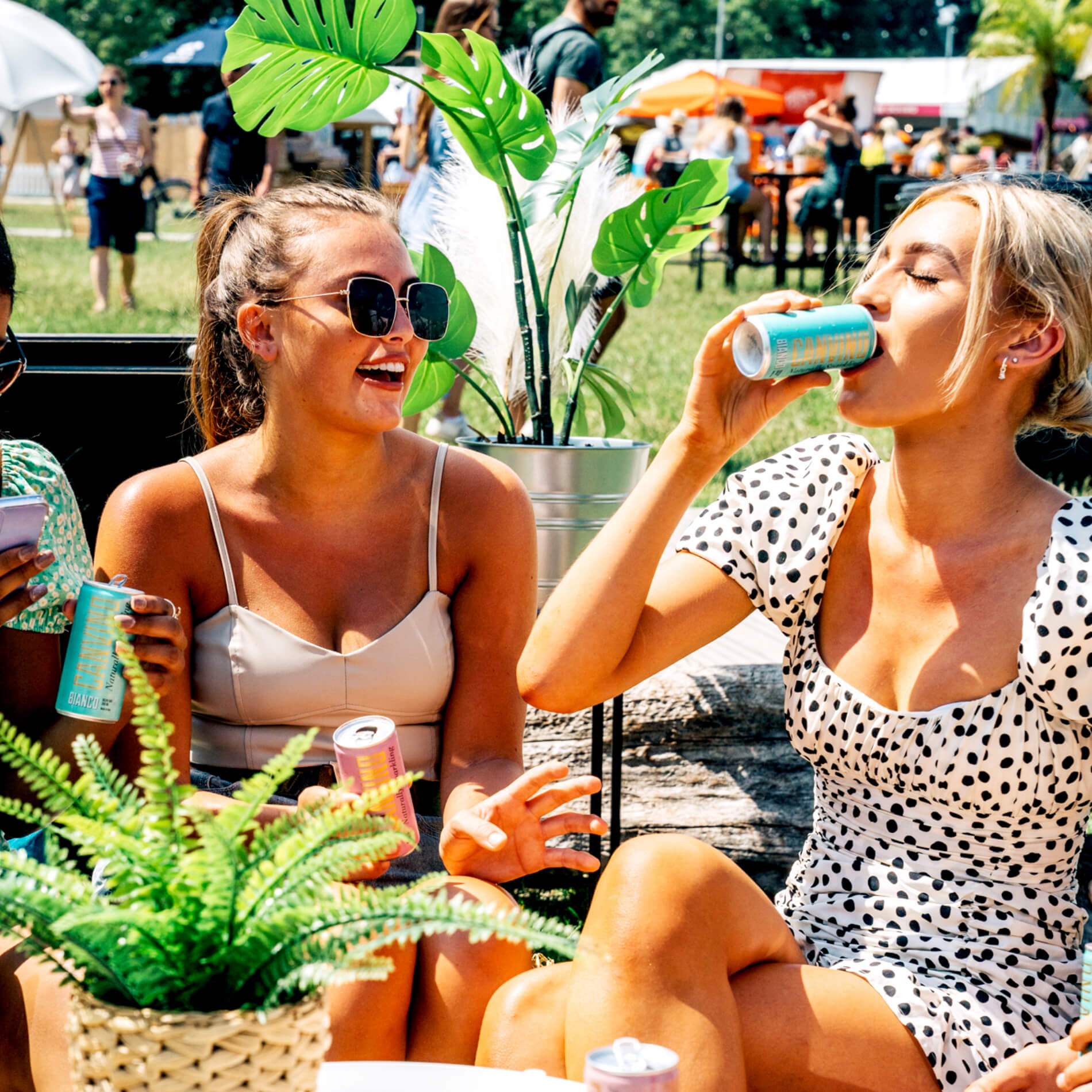 Women drinking Canvino in the sun at Taste of London